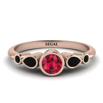 bezel_symmetrical_Ruby_Ring_2.jpg